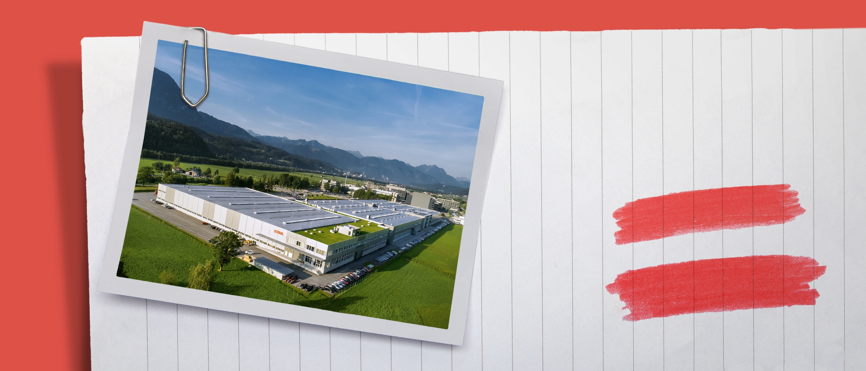 STIHL Werk in Tirol vor Bergpanorama.