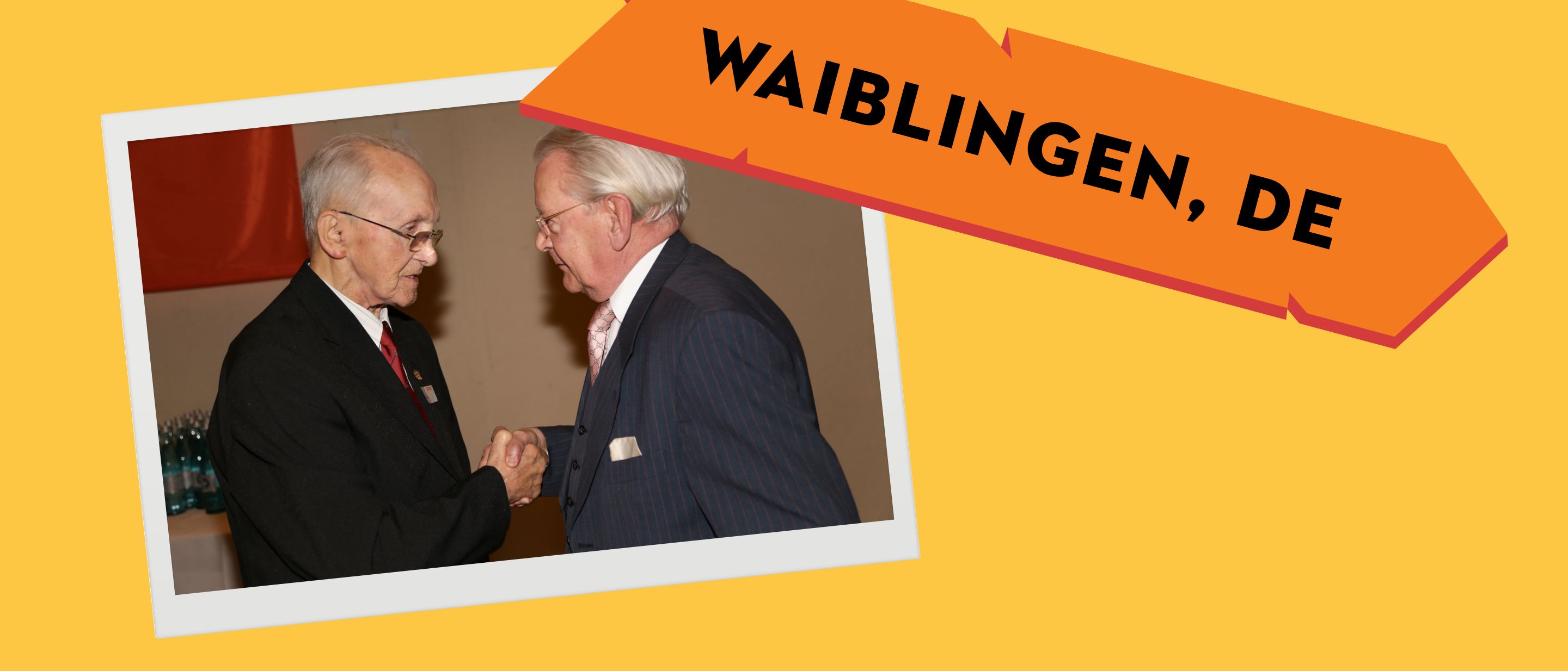 Julius W&ouml;rz sch&uuml;ttelt Hans Peter Stihl bei einer Feier in Waiblingen die Hand.